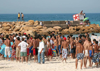 Мужчины на пляже. Тунис – фотографии Туниса