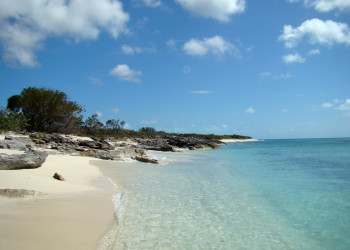 Пляж на острове Провиденсиалес в Тёркс и Кайкосе – фотографии Тёркс и Кайкос
