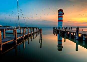 Пирс на закате Нойзидлер-Зе озеро. Австрия – фотографии Австрии