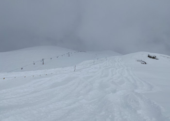 Вид с пухляка на канатную дорогу Крокус, Южный склон – фотографии России