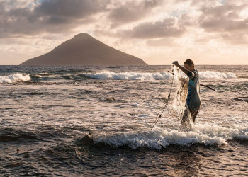 Рыбак в Тонга – фотографии Тонги