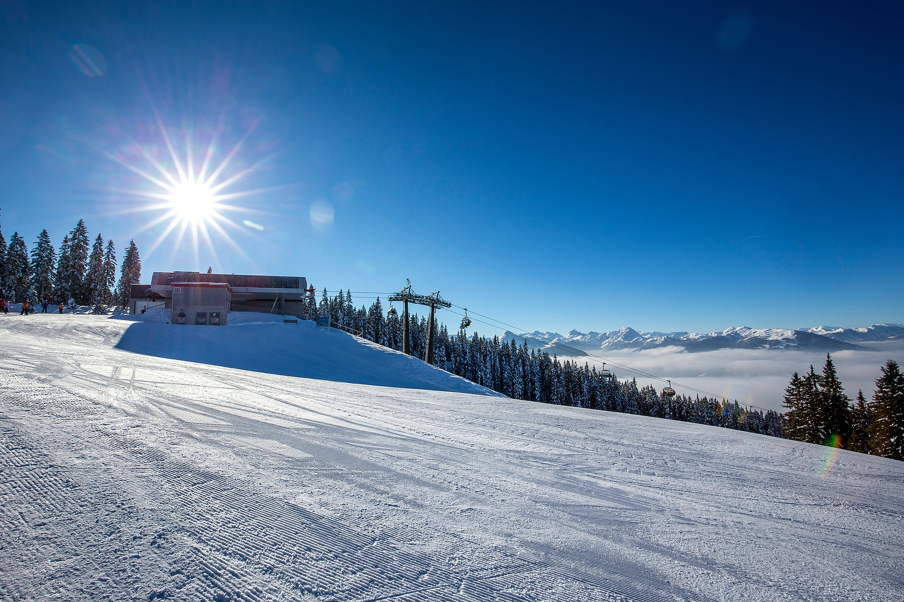 Солнце над склоном. Эбен. Австрия – фотографии Австрии