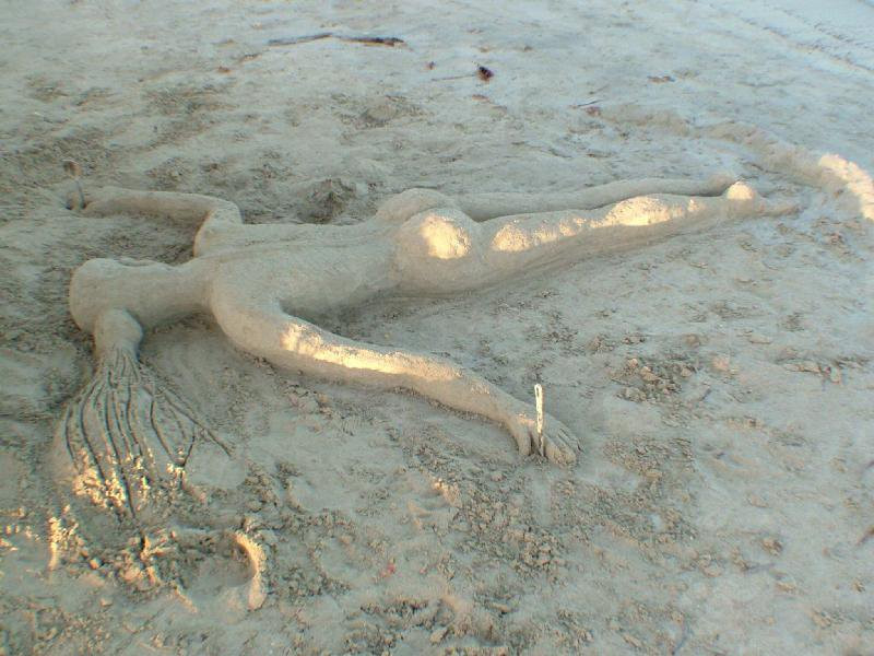 Скульптура на песке  в Ранэвэй Бэй, Ямайка – фотографии Ямайки